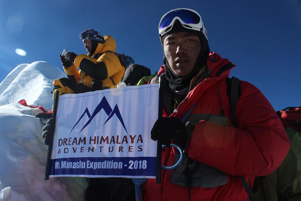 Tendi on Mt. Manaslu Summit with Dream Himalaya Adventures banner